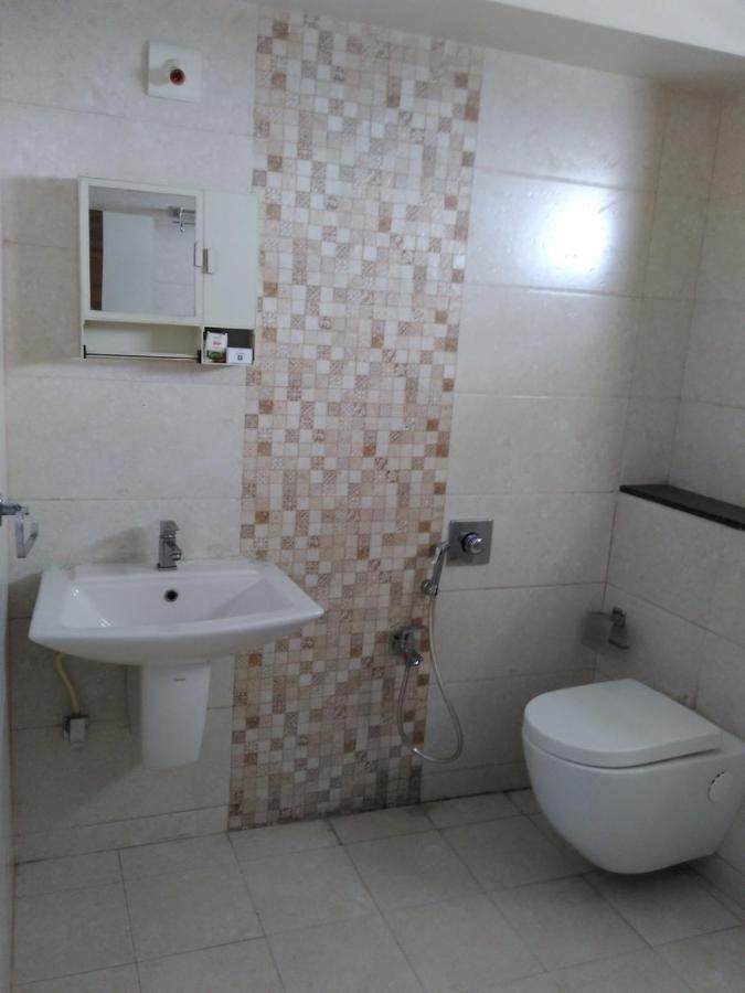 Hotel Sigma Inn Ahmedabad Bagian luar foto